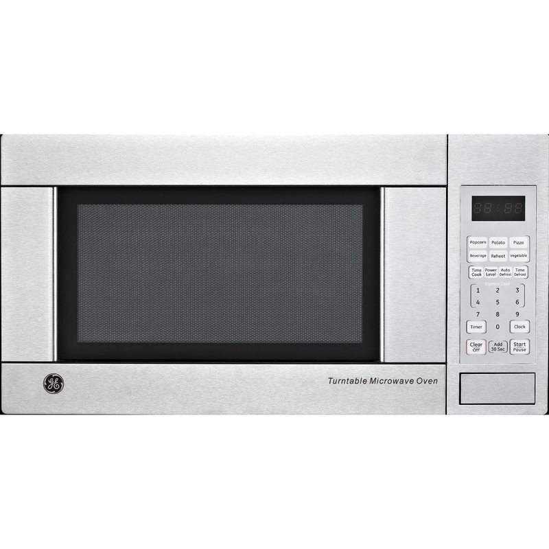 GE Four  micro-ondes de comptoir 1.1 pi cu JE1140STC